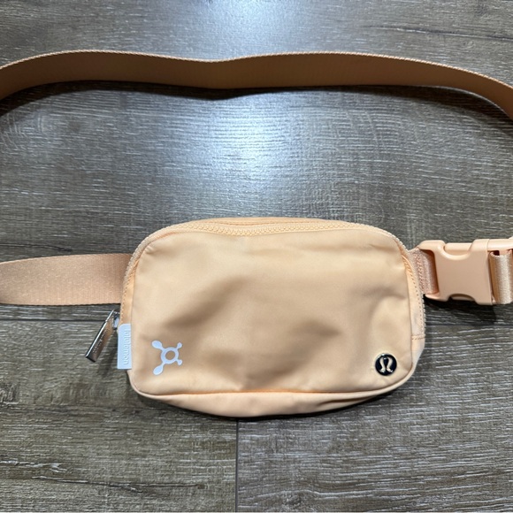 lululemon athletica Handbags - lululemon athletica x Orangetheory Peach Belt Bag